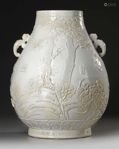 A CHINESE CARVED HU-FORM VASE, QING DYNASTY (1644-1911)