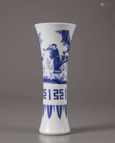 A CHINESE BLUE AND WHITE BEAKER VASE, 20TH CENTURY