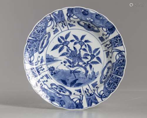 A CHINESE BLUE AND WHITE SCALLOPED DISH, 18TH CENTURY