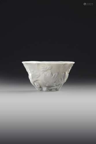 A CHINESE BLANC-DE-CHINE CUP, 18TH CENTURY
