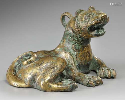 A GILT BRONZE FIGURE OF A BUDDHIST LION, YUAN/MING DYNASTY, ...