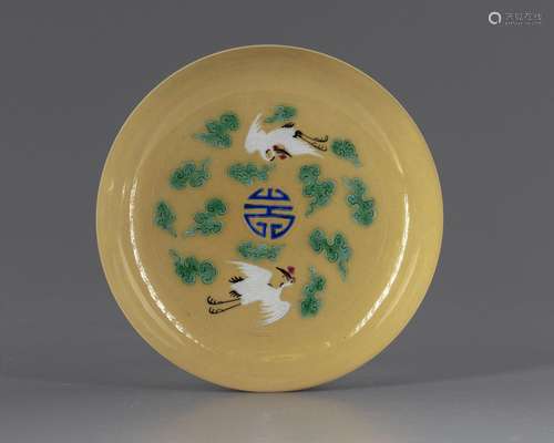 A CHINESE CRANES YELLOW DISH, 20TH CENTURY