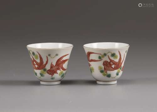 A PAIR OF CHINESE FAMILLE VERTE 'GOLDFISH' TEACUPS