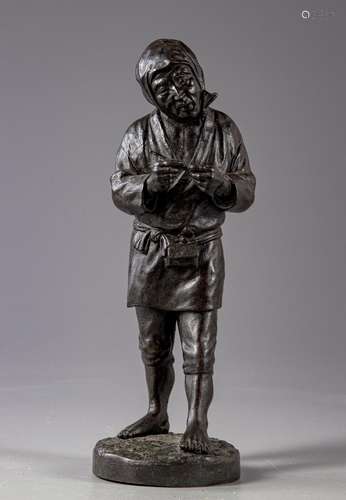 A JAPANESE BRONZE FIGURE HOLDING A PIPE, MEIJI PERIOD (1868-...