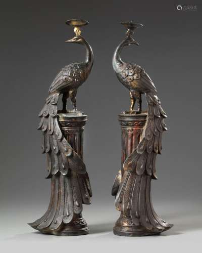 A PAIR OF CHINESE BRONZE PEACOCK CANDLE STICKS, 19TH CENTURY