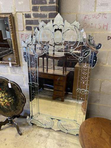 A large Venetian style etched wall mirror, width 108cm, heig...