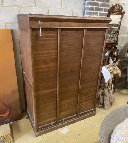 A mid century French oak triple tambour filing cabinet, widt...
