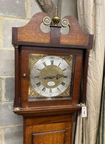 An early 19th century mahogany and banded oak eight day long...