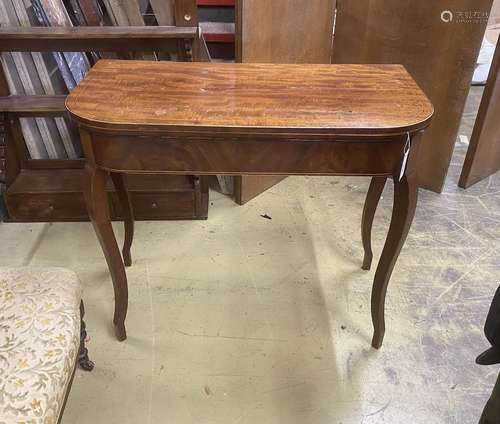 A George III banded mahogany D shaped folding card table, wi...