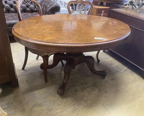 A Victorian oval figured walnut tilt top loo table, length 1...