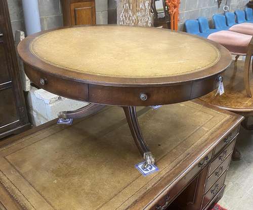 A reproduction mahogany circular drum coffee table, diameter...