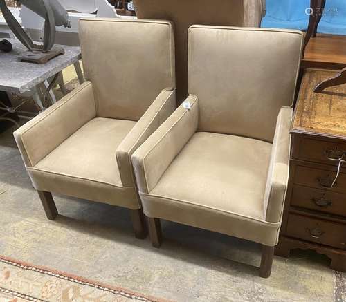 A pair of contemporary club chairs in faux suede fabric, wid...