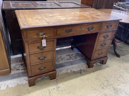 An early 20th century mahogany pedestal desk, length 122cm, ...