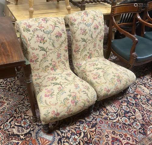 A pair of Victorian scroll frame nursing chairs, width 50cm,...