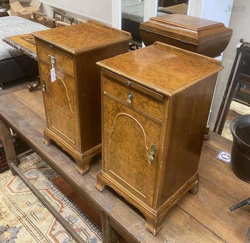 A pair of Queen Anne revival walnut bedside cabinets, Hampto...