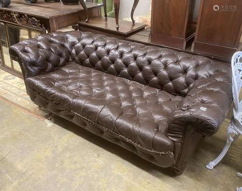 A Victorian buttoned brown leather Chesterfield settee, leng...