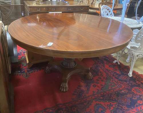 A WIlliam IV circular mahogany tilt top breakfast table on f...