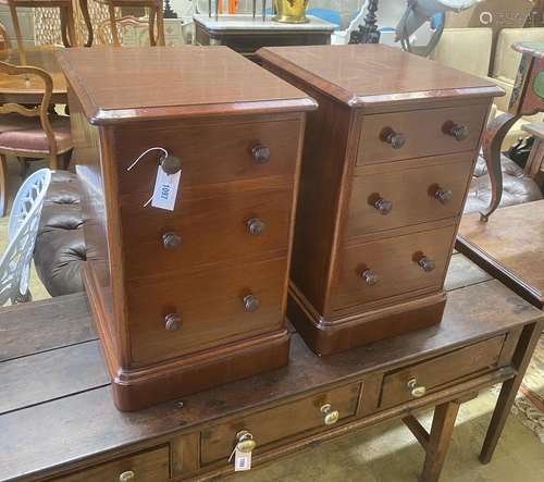 A pair of Victorian and later mahogany three drawer bedside ...