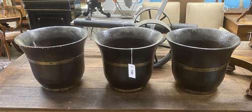 A set of three brass bound staved wood buckets, diameter 36c...