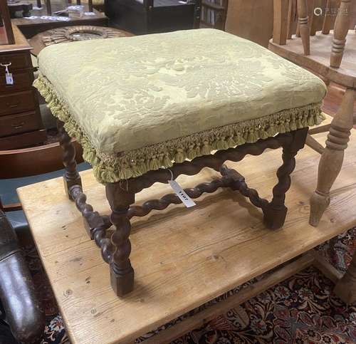 An early 20th century spiral turned walnut dressing stool, w...