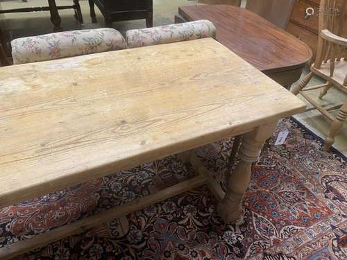 A small Victorian style rectangular pine refectory table, le...