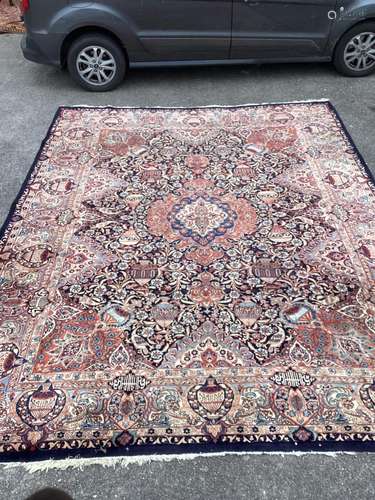 A Tabriz blue ground carpet, 390 x 290cm