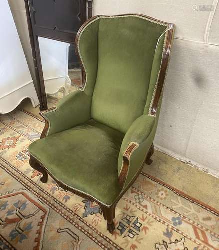 A late Victorian upholstered mahogany armchair, width 66cm, ...