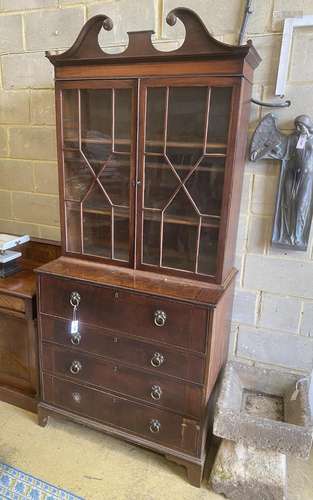 A George III banded mahogany secretaire bookcase, length 104...