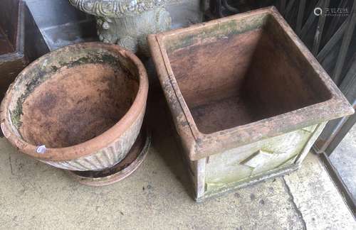 A square weathered terracotta garden planter, width 52cm, he...