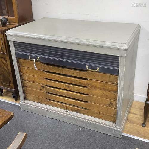 A mid century painted plan chest with tambour shutter, width...