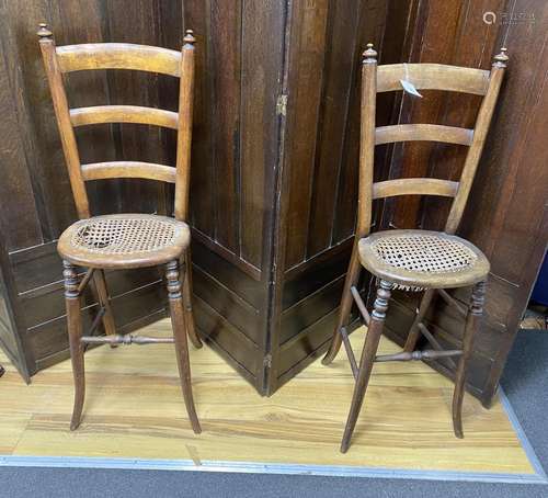 A pair of early Victorian cane seat mahogany correction chai...