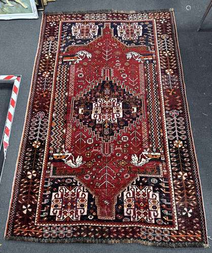 A Hamadan red ground rug, 234 x 148cm