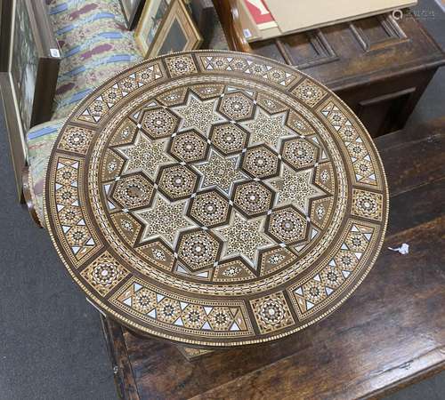 A circular Moorish inlaid occasional table, diameter 41cm, h...