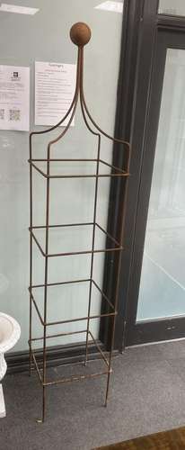 Two wrought iron garden obelisk growing frames, height 194cm