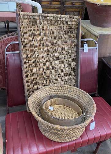 A rectangular African woven hardwood tray, two sieves and a ...