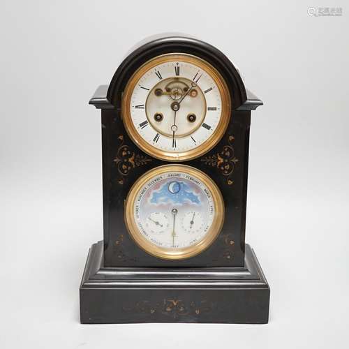 A late 19th century French black slate mantel clock with bro...