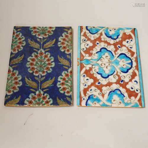 Two small Turkish Iznik pottery tiles, decorated with stylis...