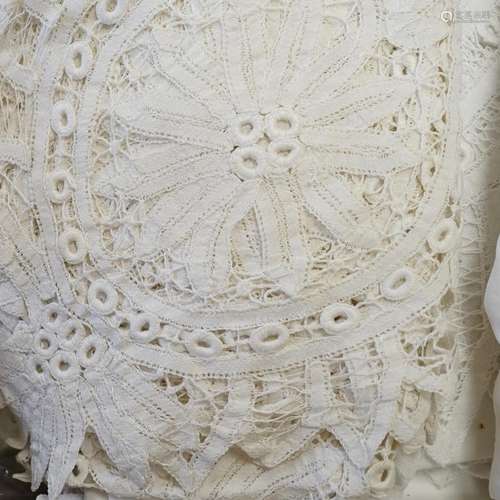 A collection of linen crochet and tape lace edged table clot...