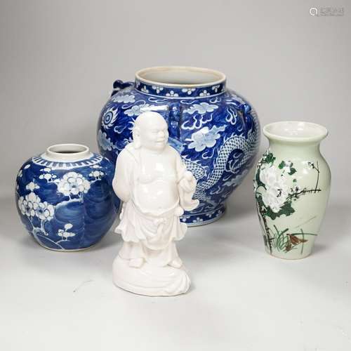 A group of Chinese ceramics including a celadon glazed vase,...