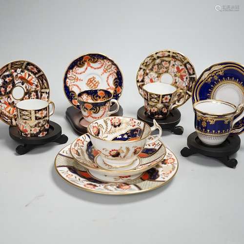 Three pairs of Royal Crown Derby porcelain cups and saucers,...