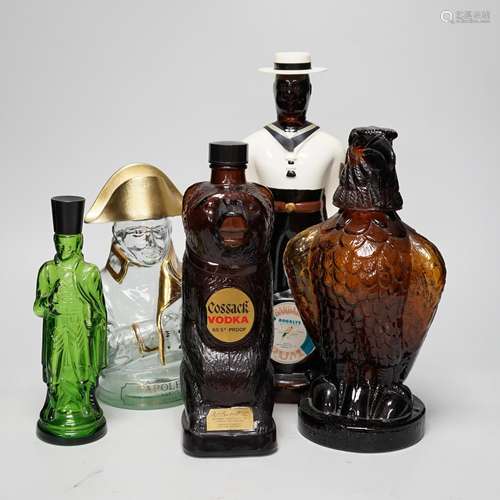 Five novelty empty flasks including Napoleon brandy and Coss...