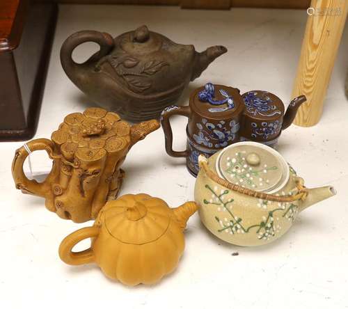 Four Chinese Yixing teapots and a Japanese sharkskin glazed ...