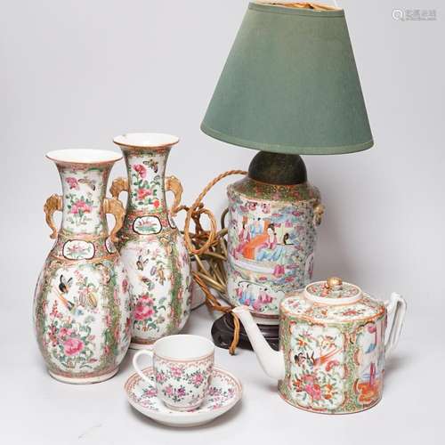 A pair of Chinese famille rose vases and a lamp base and a t...