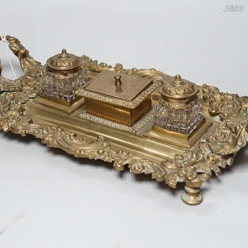 An early 20th century French cast brass desk stand, 45cm lon...