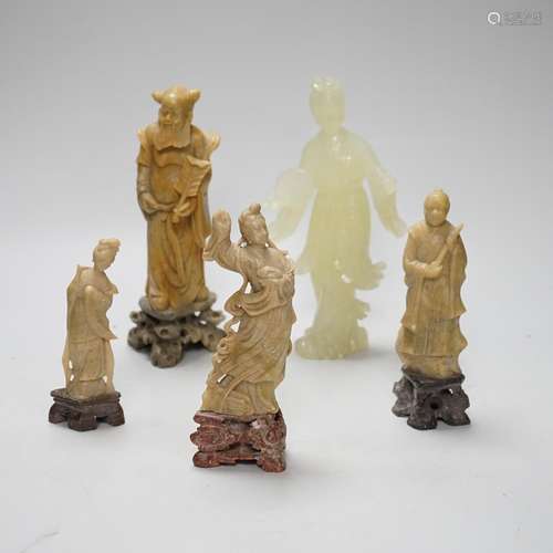 A Chinese bowenite figure and four Chinese carved soapstone ...