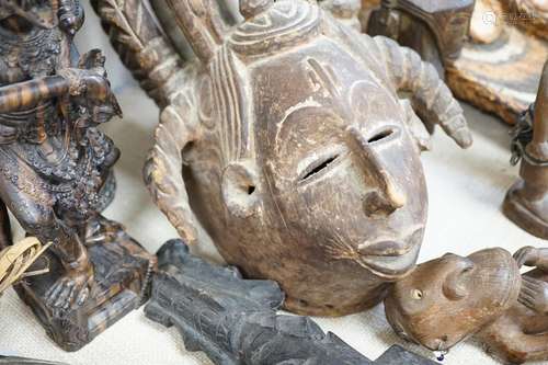 A collection of tribal carvings and masks mostly from Papa N...