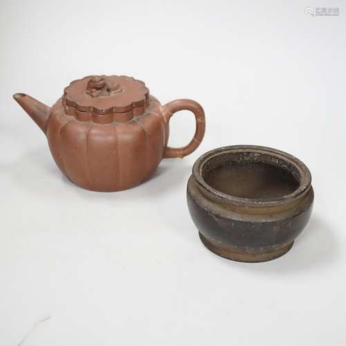 A Chinese Yixing teapot and a bronze censer, teapot 10 cm hi...