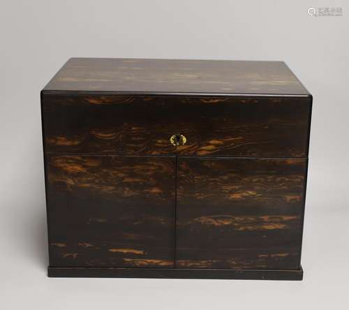 A Victorian coromandel wood two door decanter box, with two ...