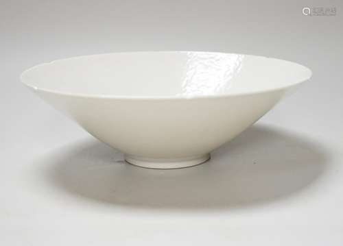 A Chinese white Anhua decorated conical dish, 20cm