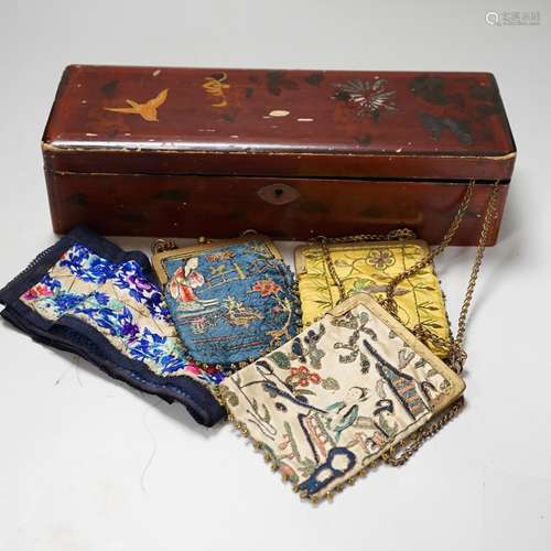 A lacquer box of Chinese embroidered purses and embroideries...